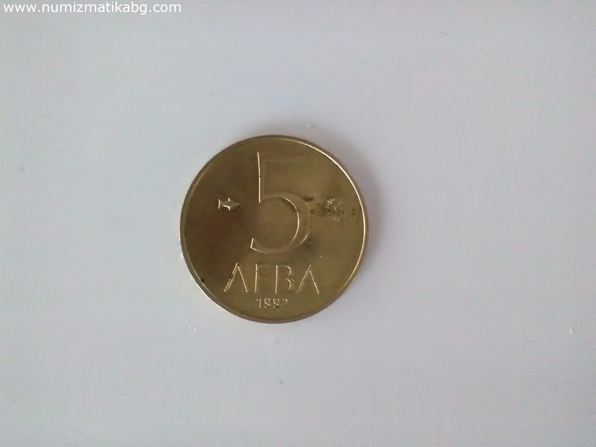 Монета